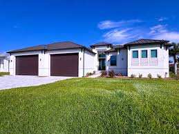 New home with dark tile roof