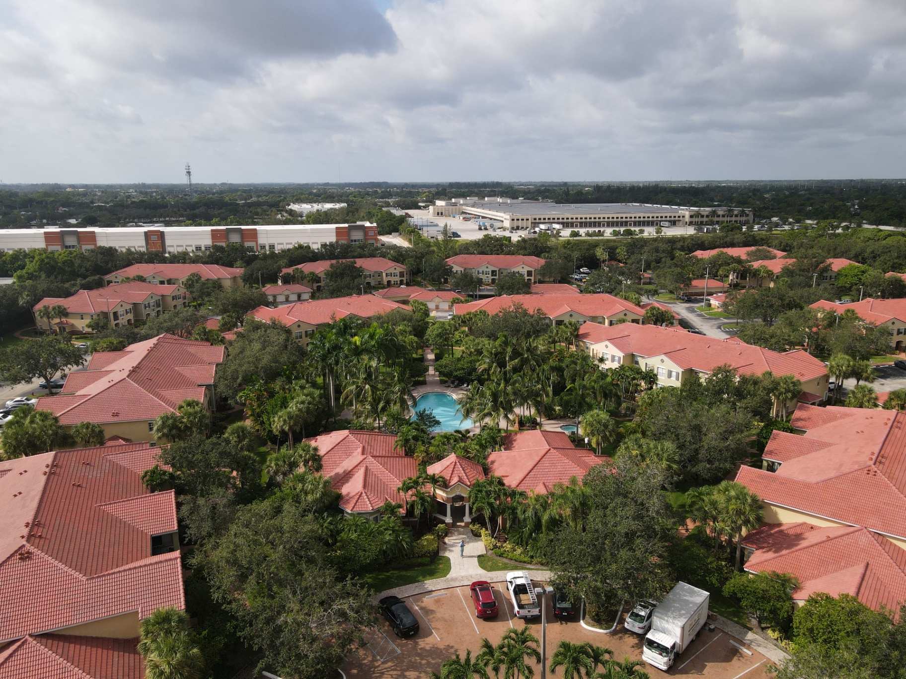 Spa community tile roofing aerial view with pool