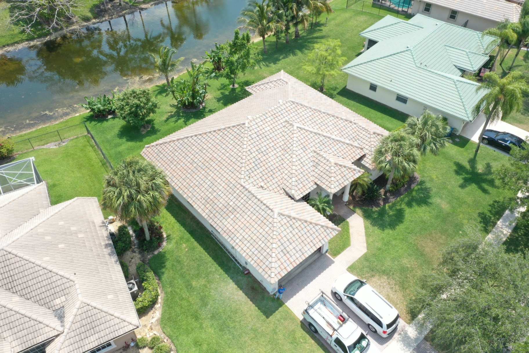 Light tile roof home near waterway