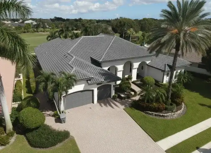 Residential roof replacement in Palm Beach County - shingle and tile installation