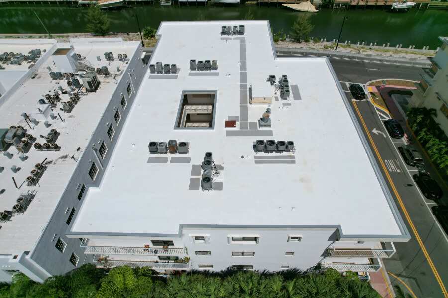 TPO roof waterfront condo building aerial